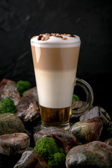 Mocha white coffee with milk, chocolate, syrup, slices, liqueur, pine nuts. Coffee card. Espresso based drinks.