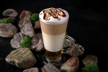 Mocha white coffee with milk, chocolate, syrup, slices, liqueur, pine nuts. Coffee card. Espresso based drinks.