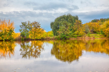 lake in autumn colors with reflection