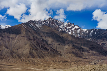 Panorama of the beautiful mountains that surround Leh at sunlight - Ladakh, Jammu and Kashmir, India.