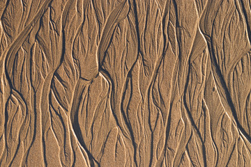 wave textures in the sand 