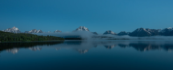 Blue Light in Sky and Waters of Teton Range