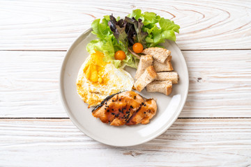 salmon teriyaki steak with fried egg and salad