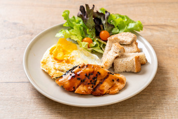 salmon teriyaki steak with fried egg and salad