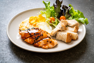 salmon teriyaki steak with fried egg and salad