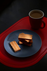 Chocolate wafers and coffee