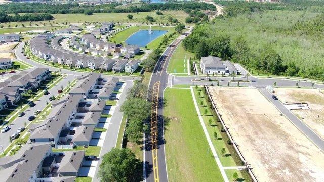 Backroad along newly constructed homes in a suburban neighborhood