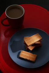 Obraz na płótnie Canvas Chocolate wafers and coffee