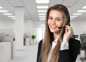 Beautiful businesswoman portrait  with headset , isolated.