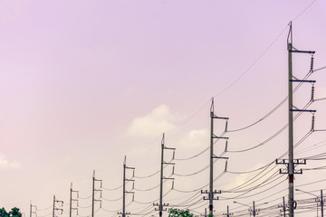 High voltage electricity pylon for electric supply transmission with blue sky, Power distribution technology and generator infracstructure equipment