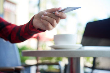 Customer paying for coffee