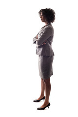 Side View of a black businesswoman or an anonymous female presidential candidate.  The person is backlit and isolated on a white background.