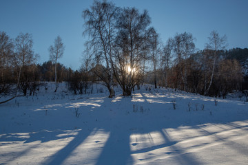 Fototapeta na wymiar Winter snow-covered and frosty Altai. Altai blue eyes