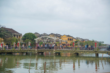 Fototapeta na wymiar Hoi An city and its architecture, river, market and food.