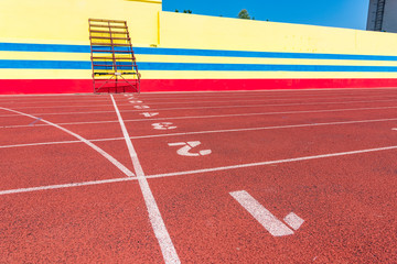 Outdoor track and field stadium runway sprint to the finish