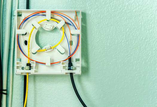 Fiber optic splicing with protection sleeve and blue fiber installed in optical terminate box for Passive optical network or Fiber to the home