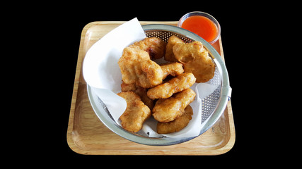 chicken nuggets with clipping part isolated on black background