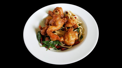 stir fried spaghetti with dried chili and soft shell crab, clipping part isolated on black background