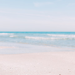Fototapeta na wymiar Summer sand beach and seashore waves background