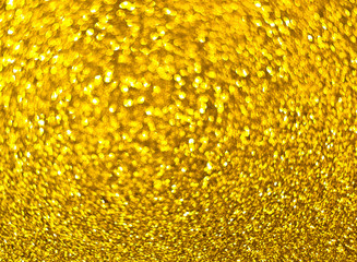 Textured golden background with brilliance