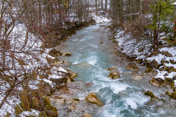 alpine stream at winter time