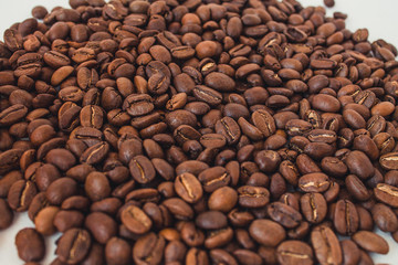  Background of coffee beans. Coffee is on the table