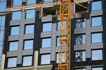 Crane attachment at a construction site. Construction close up.