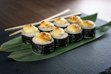 Rolls on bamboo leaves on shale Board