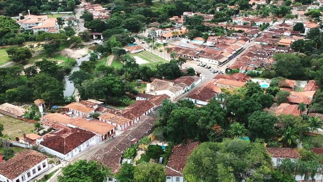 Drone footage of the downtown area of the city of Pirenopolis, Brazil, including aerial footage of a local church.