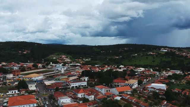 Drone footage of the downtown area of the city of Pirenopolis, Brazil, including aerial footage of a local church.