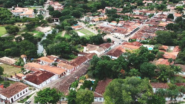 Drone footage of the downtown area of the city of Pirenopolis, Brazil, including aerial footage of a local church.