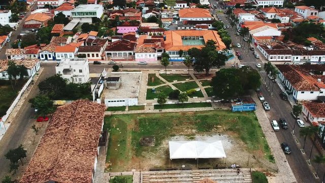 Drone footage of the downtown area of the city of Pirenopolis, Brazil, including aerial footage of a local church.