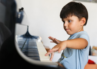 Child playing piano