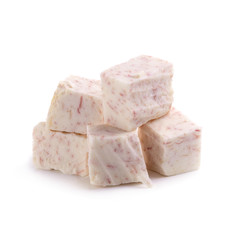 Cube of taro root isolated on a white background.