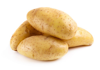 Fresh potatoes isolated over a white background.