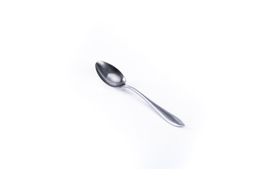Silver tea spoon on a white background.