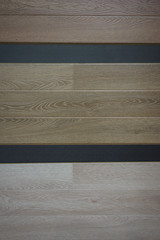 Texture of wooden floorboar and parquet closeup. Elements of finishing in the premises. 