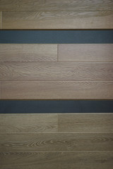 Texture of wooden floorboar and parquet closeup. Elements of finishing in the premises. 