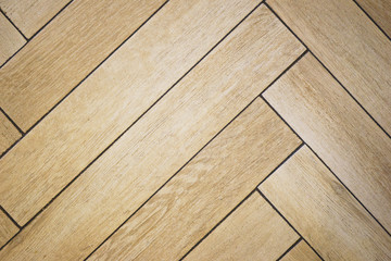 Fototapeta premium Texture of wooden floorboar and parquet closeup. Elements of finishing in the premises. 