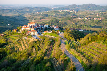 Village Šmartno between vineyards in wine region Brda in Slovenia - obrazy, fototapety, plakaty