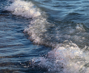 Waves on the seashore as an abstract background