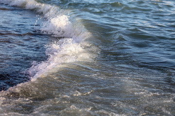 Waves on the seashore as an abstract background