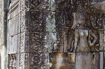 Decoration Detail of Bayon Temple in Angkor Thom is The Heritage of Khmer Empire at Siem Reap Province, Cambodia.