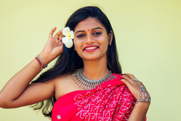 Closeup headshot portrait of attitude confident smiling happy pretty young woman background of...