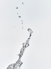 splash water coming out of the bottle