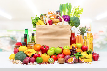 Colorful food and groceries on white countertop