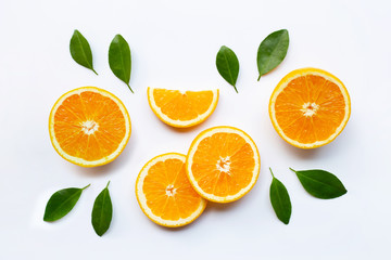 Fresh orange citrus fruit with leaves on white