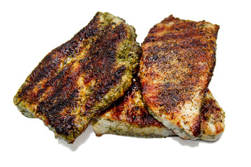 Grilled steaks with spices on white background, isolated