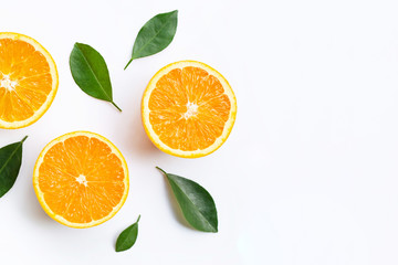 Top view of orange fruits and leaves isolated on white background.