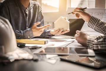 Business meeting construction engineer discussing architect plan